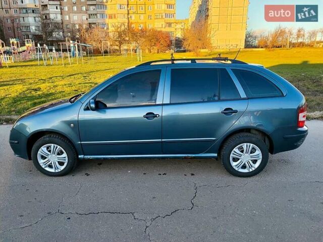 Серый Шкода Фабия, объемом двигателя 1.39 л и пробегом 204 тыс. км за 2900 $, фото 6 на Automoto.ua