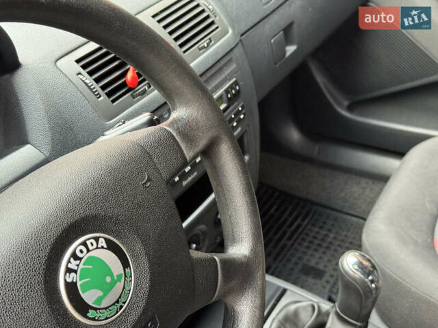 Серый Шкода Фабия, объемом двигателя 1.39 л и пробегом 208 тыс. км за 3999 $, фото 19 на Automoto.ua