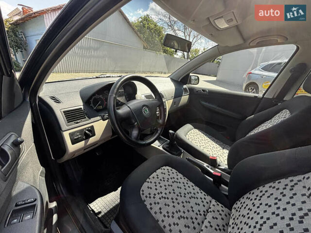 Серый Шкода Фабия, объемом двигателя 1.4 л и пробегом 272 тыс. км за 4500 $, фото 17 на Automoto.ua