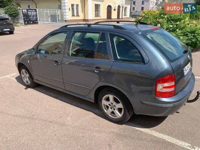 Серый Шкода Фабия, объемом двигателя 1.39 л и пробегом 191 тыс. км за 4550 $, фото 12 на Automoto.ua
