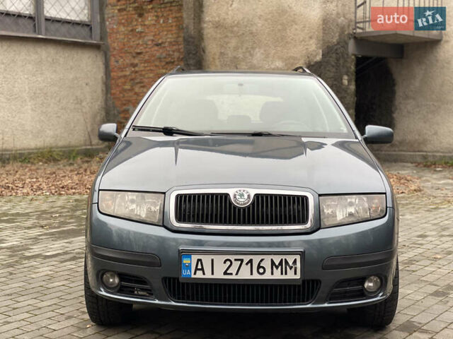 Серый Шкода Фабия, объемом двигателя 1.4 л и пробегом 258 тыс. км за 3950 $, фото 11 на Automoto.ua