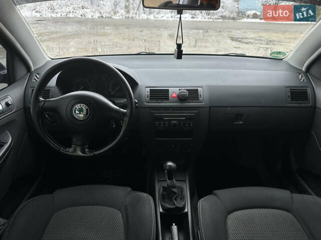 Сірий Шкода Фабія, об'ємом двигуна 1.4 л та пробігом 147 тис. км за 3870 $, фото 13 на Automoto.ua