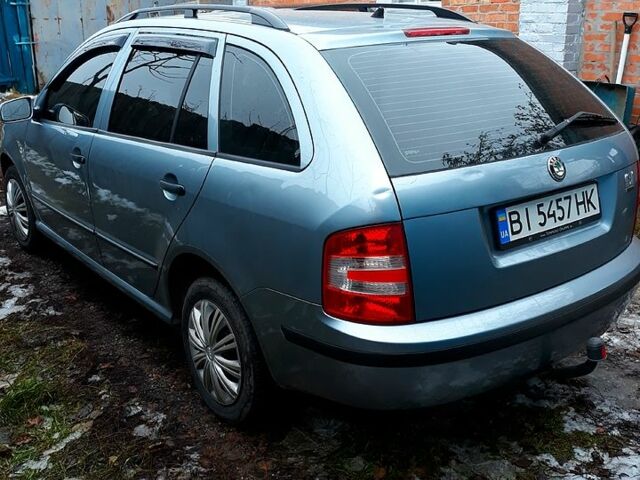 Серый Шкода Фабия, объемом двигателя 1.4 л и пробегом 165 тыс. км за 4450 $, фото 4 на Automoto.ua