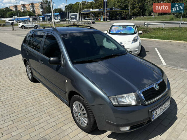 Серый Шкода Фабия, объемом двигателя 1.4 л и пробегом 272 тыс. км за 4500 $, фото 15 на Automoto.ua