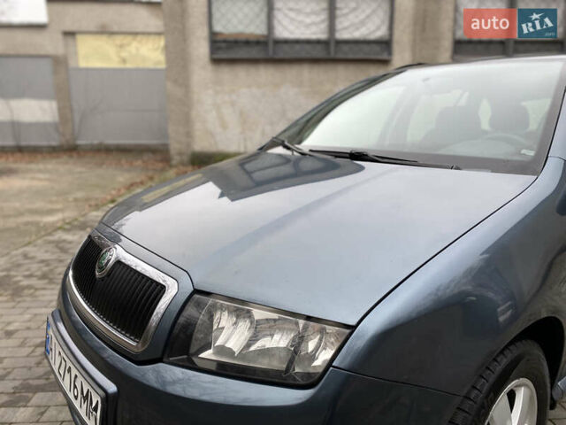 Серый Шкода Фабия, объемом двигателя 1.4 л и пробегом 258 тыс. км за 3950 $, фото 12 на Automoto.ua