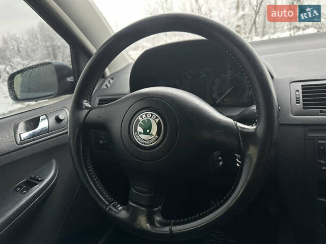 Сірий Шкода Фабія, об'ємом двигуна 1.4 л та пробігом 147 тис. км за 3870 $, фото 14 на Automoto.ua