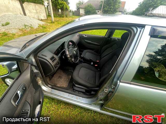 Серый Шкода Фабия, объемом двигателя 1.4 л и пробегом 233 тыс. км за 4000 $, фото 4 на Automoto.ua