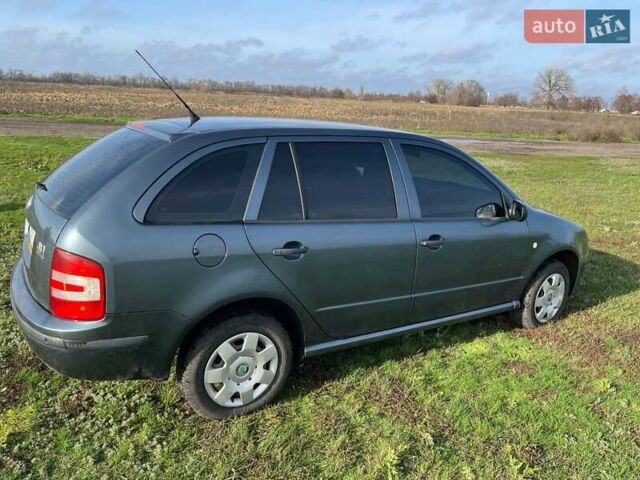 Серый Шкода Фабия, объемом двигателя 1.4 л и пробегом 250 тыс. км за 4499 $, фото 3 на Automoto.ua