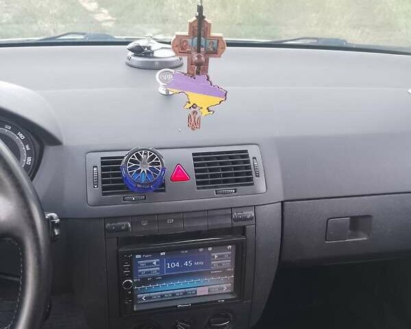 Серый Шкода Фабия, объемом двигателя 1.39 л и пробегом 241 тыс. км за 5000 $, фото 6 на Automoto.ua