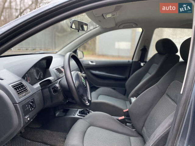 Серый Шкода Фабия, объемом двигателя 1.4 л и пробегом 258 тыс. км за 3950 $, фото 16 на Automoto.ua