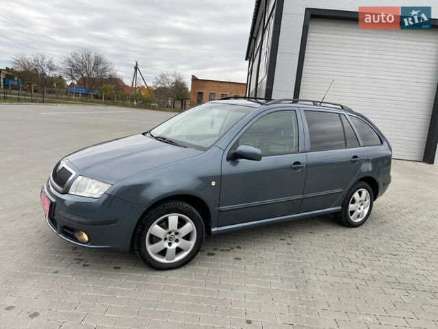 Серый Шкода Фабия, объемом двигателя 1.4 л и пробегом 165 тыс. км за 5450 $, фото 1 на Automoto.ua