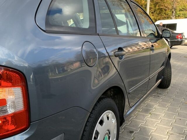 Серый Шкода Фабия, объемом двигателя 1.4 л и пробегом 225 тыс. км за 4450 $, фото 6 на Automoto.ua