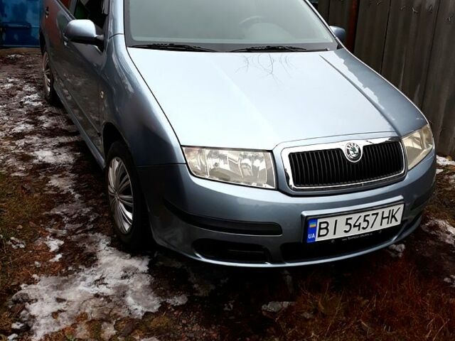 Серый Шкода Фабия, объемом двигателя 1.4 л и пробегом 165 тыс. км за 4450 $, фото 3 на Automoto.ua