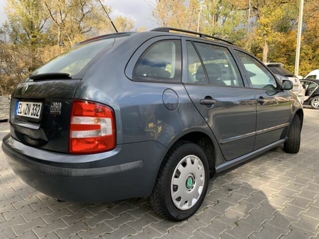 Серый Шкода Фабия, объемом двигателя 1.4 л и пробегом 225 тыс. км за 4450 $, фото 5 на Automoto.ua