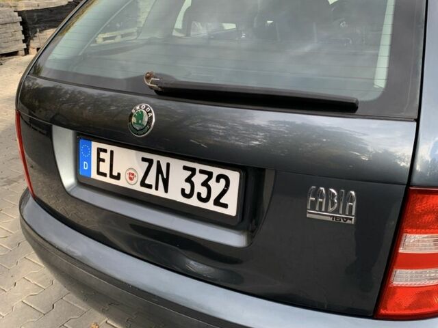 Серый Шкода Фабия, объемом двигателя 1.4 л и пробегом 225 тыс. км за 4450 $, фото 4 на Automoto.ua