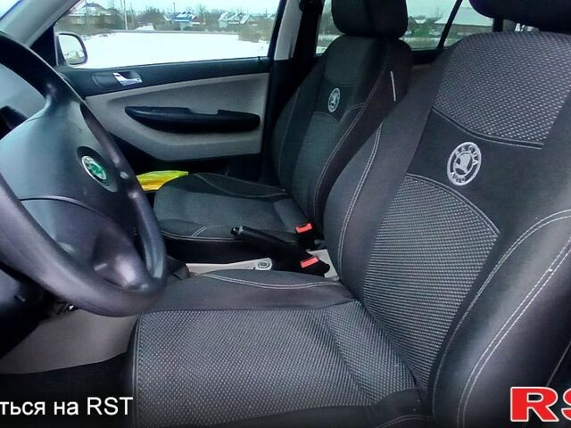 Серый Шкода Фабия, объемом двигателя 1.4 л и пробегом 161 тыс. км за 4950 $, фото 5 на Automoto.ua