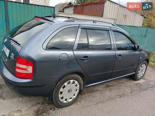 Серый Шкода Фабия, объемом двигателя 1.39 л и пробегом 297 тыс. км за 3800 $, фото 3 на Automoto.ua
