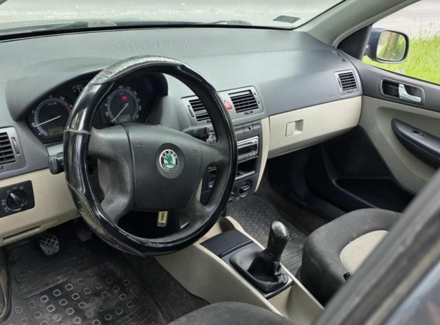 Сірий Шкода Фабія, об'ємом двигуна 1.4 л та пробігом 247 тис. км за 1931 $, фото 1 на Automoto.ua