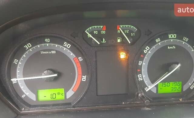 Серый Шкода Фабия, объемом двигателя 1.39 л и пробегом 155 тыс. км за 4650 $, фото 6 на Automoto.ua