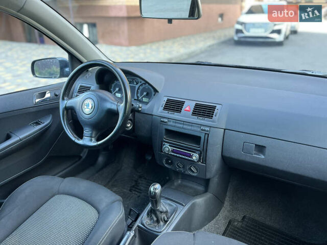 Шкода Фабия 2006 в Чернигове на Automoto.ua Серый Шкода Фабия, объемом двигателя 1.4 л и пробегом 196 тыс. км за 4900 $, фото 18 на Automoto.ua