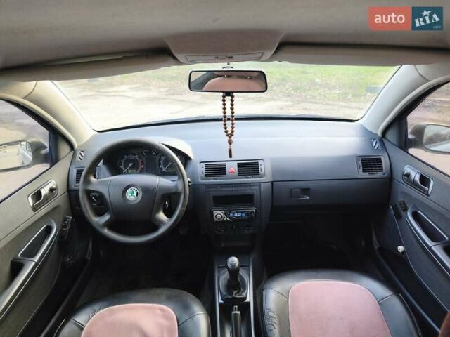 Серый Шкода Фабия, объемом двигателя 1.2 л и пробегом 235 тыс. км за 3800 $, фото 18 на Automoto.ua