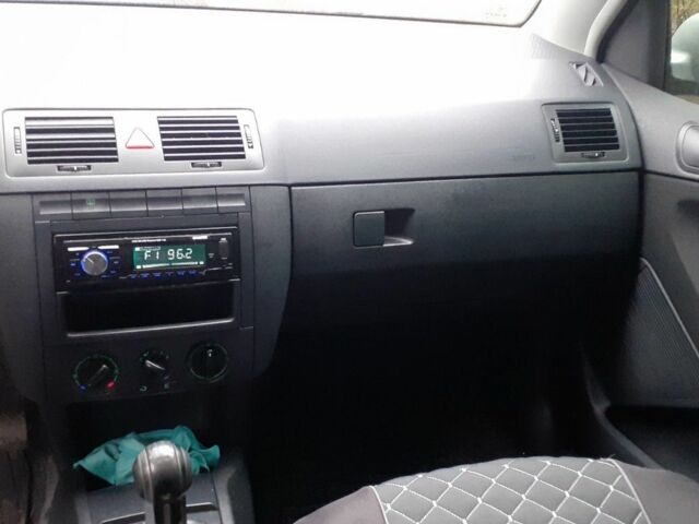 Серый Шкода Фабия, объемом двигателя 1.4 л и пробегом 188 тыс. км за 4199 $, фото 7 на Automoto.ua