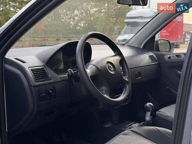 Серый Шкода Фабия, объемом двигателя 1.39 л и пробегом 220 тыс. км за 4200 $, фото 12 на Automoto.ua