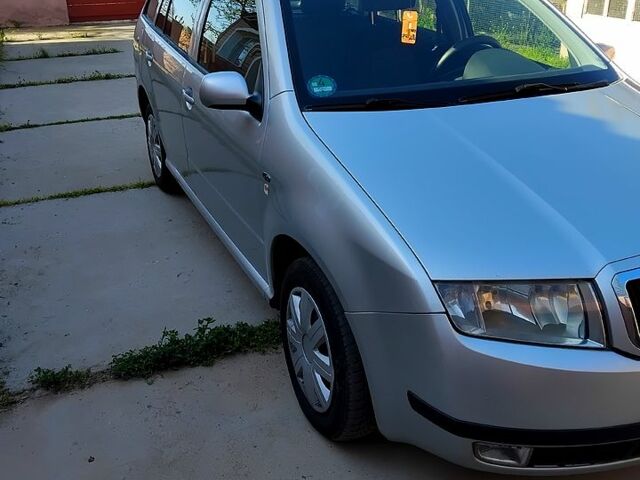 Серый Шкода Фабия, объемом двигателя 1.4 л и пробегом 208 тыс. км за 4400 $, фото 2 на Automoto.ua