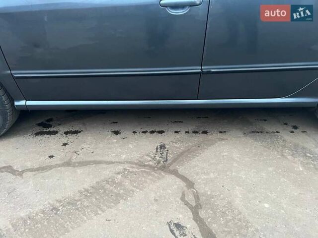 Серый Шкода Фабия, объемом двигателя 1.2 л и пробегом 193 тыс. км за 3200 $, фото 2 на Automoto.ua