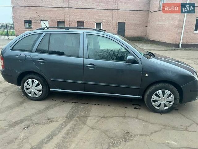 Серый Шкода Фабия, объемом двигателя 1.2 л и пробегом 193 тыс. км за 3200 $, фото 6 на Automoto.ua