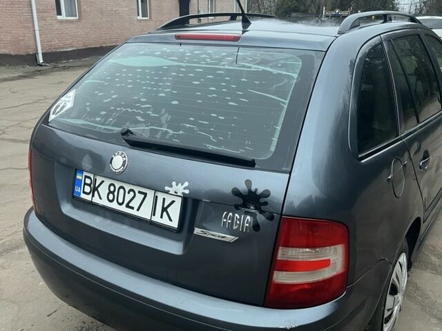 Серый Шкода Фабия, объемом двигателя 1.2 л и пробегом 193 тыс. км за 3200 $, фото 2 на Automoto.ua