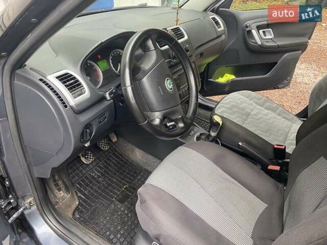 Серый Шкода Фабия, объемом двигателя 1.39 л и пробегом 302 тыс. км за 4950 $, фото 11 на Automoto.ua