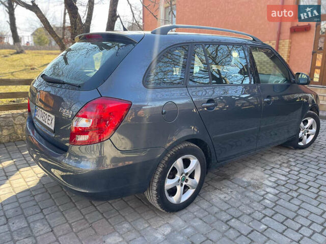 Серый Шкода Фабия, объемом двигателя 1.39 л и пробегом 180 тыс. км за 5500 $, фото 3 на Automoto.ua