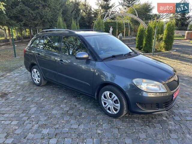 Серый Шкода Фабия, объемом двигателя 1.4 л и пробегом 165 тыс. км за 5800 $, фото 2 на Automoto.ua