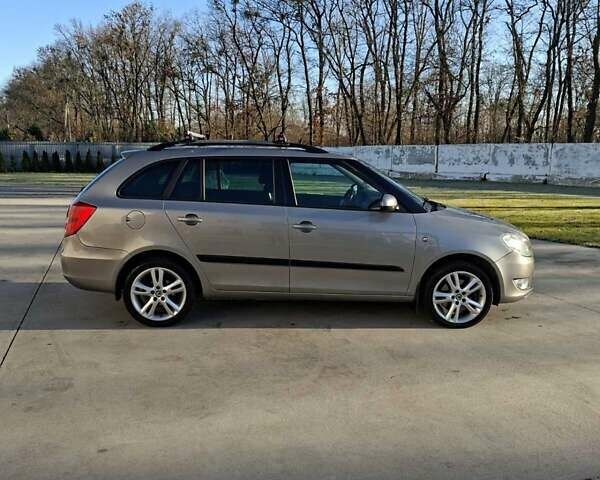 Серый Шкода Фабия, объемом двигателя 1.6 л и пробегом 260 тыс. км за 8200 $, фото 2 на Automoto.ua