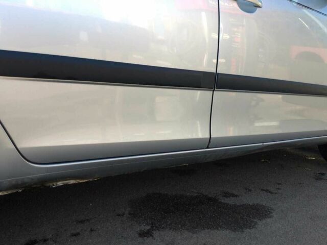 Серый Шкода Фабия, объемом двигателя 1.4 л и пробегом 218 тыс. км за 5000 $, фото 7 на Automoto.ua