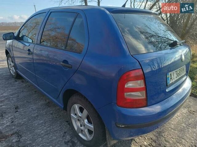 Синий Шкода Фабия, объемом двигателя 1.4 л и пробегом 330 тыс. км за 2600 $, фото 5 на Automoto.ua