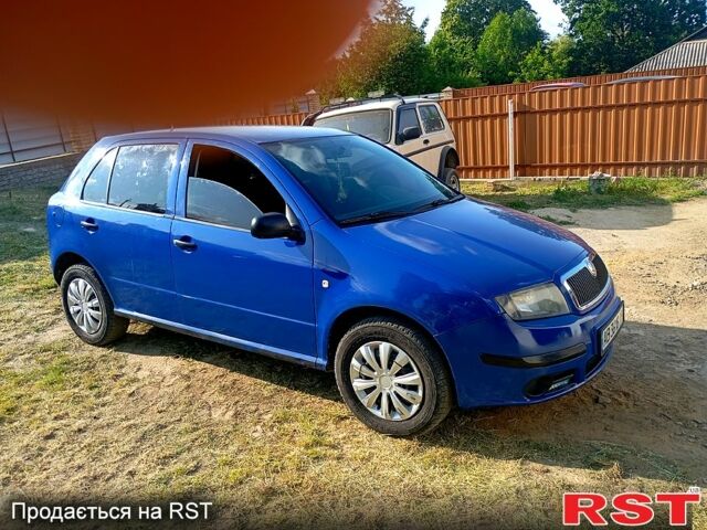Синий Шкода Фабия, объемом двигателя 1.2 л и пробегом 209 тыс. км за 2500 $, фото 2 на Automoto.ua