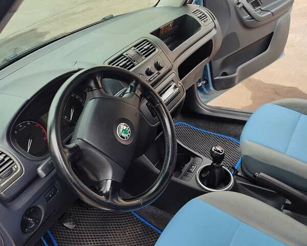 Синий Шкода Фабия, объемом двигателя 1.2 л и пробегом 199 тыс. км за 4800 $, фото 12 на Automoto.ua