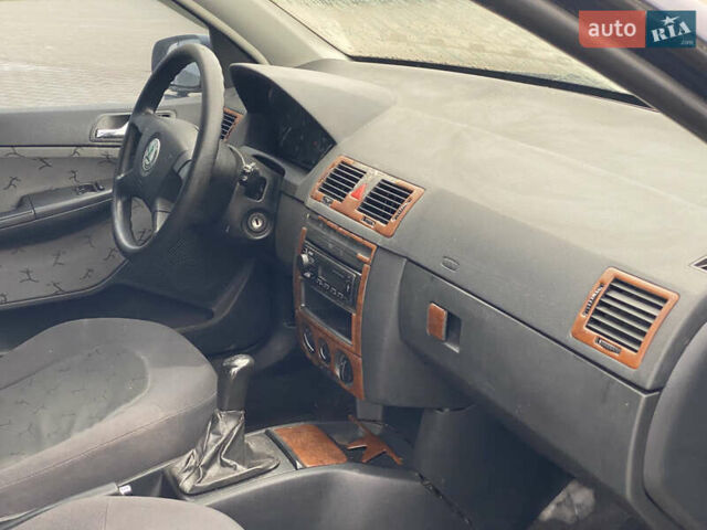 Синий Шкода Фабия, объемом двигателя 1.39 л и пробегом 282 тыс. км за 1200 $, фото 16 на Automoto.ua