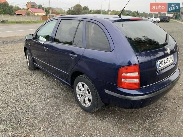 Синий Шкода Фабия, объемом двигателя 1.39 л и пробегом 288 тыс. км за 3400 $, фото 15 на Automoto.ua