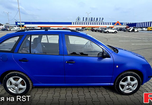 Синий Шкода Фабия, объемом двигателя 1.2 л и пробегом 331 тыс. км за 2600 $, фото 6 на Automoto.ua