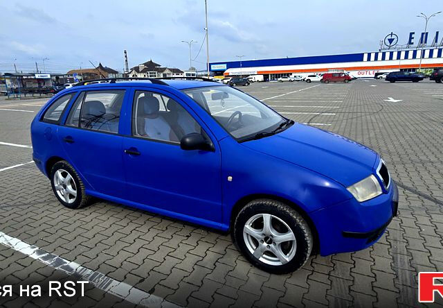 Синий Шкода Фабия, объемом двигателя 1.2 л и пробегом 331 тыс. км за 2600 $, фото 5 на Automoto.ua