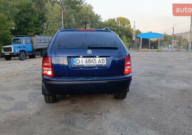 Синий Шкода Фабия, объемом двигателя 1.4 л и пробегом 200 тыс. км за 3500 $, фото 3 на Automoto.ua