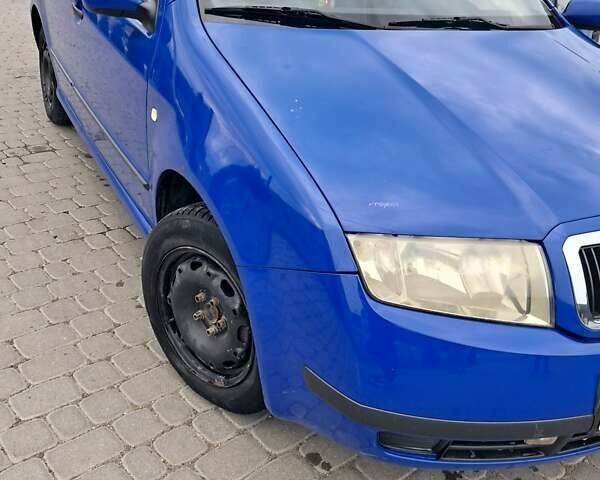 Синій Шкода Фабія, об'ємом двигуна 1.39 л та пробігом 323 тис. км за 3600 $, фото 3 на Automoto.ua