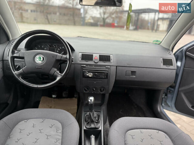 Синий Шкода Фабия, объемом двигателя 1.4 л и пробегом 190 тыс. км за 3900 $, фото 12 на Automoto.ua