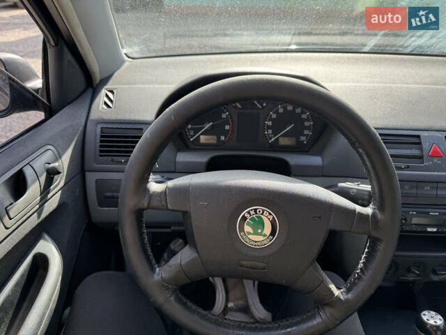 Синий Шкода Фабия, объемом двигателя 1.2 л и пробегом 289 тыс. км за 2750 $, фото 10 на Automoto.ua