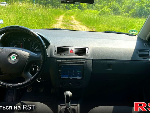 Синий Шкода Фабия, объемом двигателя 1.2 л и пробегом 224 тыс. км за 3900 $, фото 8 на Automoto.ua