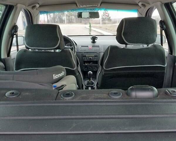 Синий Шкода Фабия, объемом двигателя 1.4 л и пробегом 230 тыс. км за 4250 $, фото 14 на Automoto.ua