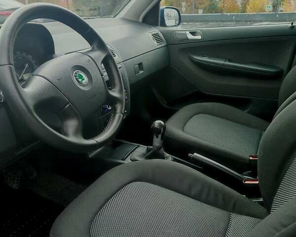 Синий Шкода Фабия, объемом двигателя 1.4 л и пробегом 228 тыс. км за 4600 $, фото 8 на Automoto.ua